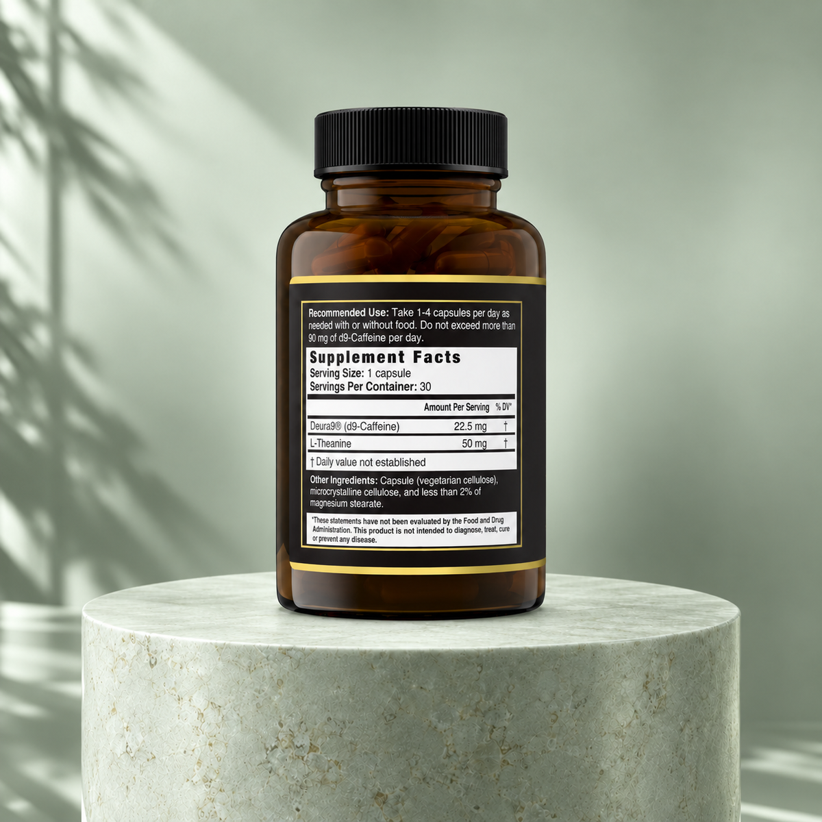 Caffeine 2.0 + L-Theanine Supplement Facts bottle on a sage green stone pedestal: 22.5 mg Deura9 d9-caffeine and 50 mg L-theanine per capsule, 30 servings.